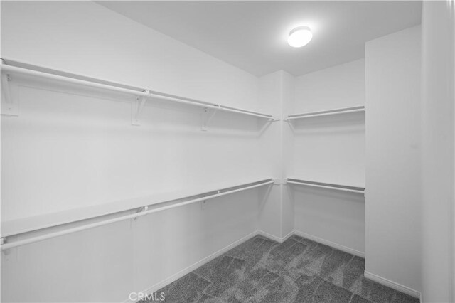 36845 Gemina Ave, Murrieta, CA 92563 - spacious closet featuring dark colored carpet