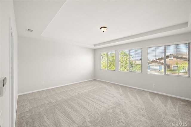 36845 Gemina Ave, Murrieta, CA 92563 - spare room with a raised ceiling and carpet floors