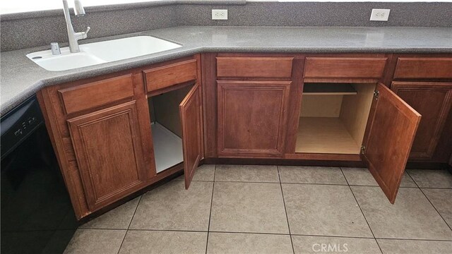 9019 Fremont Ct, Oak Hills, CA 92344 - kitchen featuring dishwasher, light tile patterned flooring, brown cabinetry, and open shelves