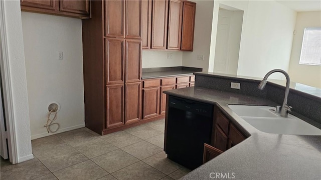 9019 Fremont Ct, Oak Hills, CA 92344 - kitchen featuring dishwasher, light tile patterned floors, dark countertops, and brown cabinets