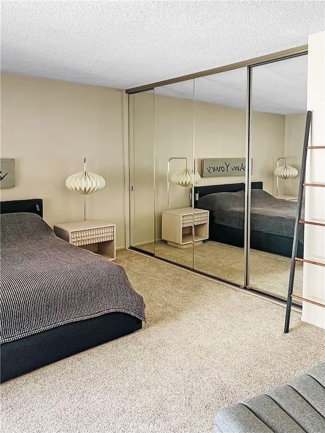 400 S Flower St Unit 131, Orange, CA 92868 - bedroom with carpet, a closet, and a textured ceiling