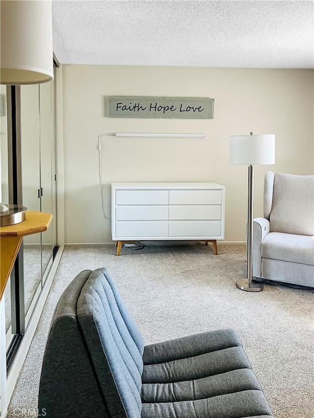400 S Flower St Unit 131, Orange, CA 92868 - living area featuring carpet floors and a textured ceiling
