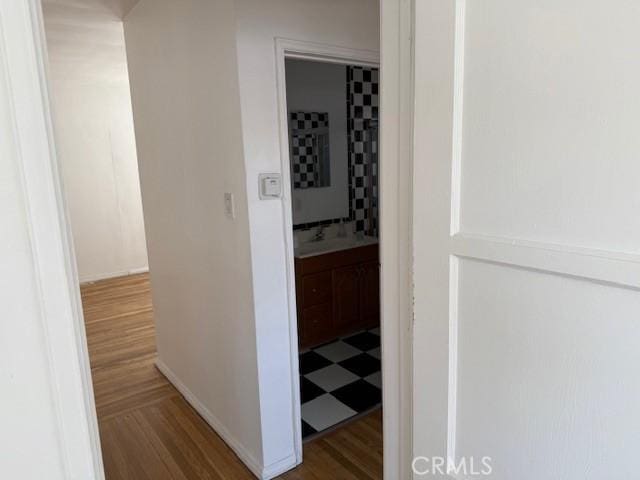 2208 W Olympic Blvd, Montebello, CA 90640 - hall featuring wood finished floors and baseboards