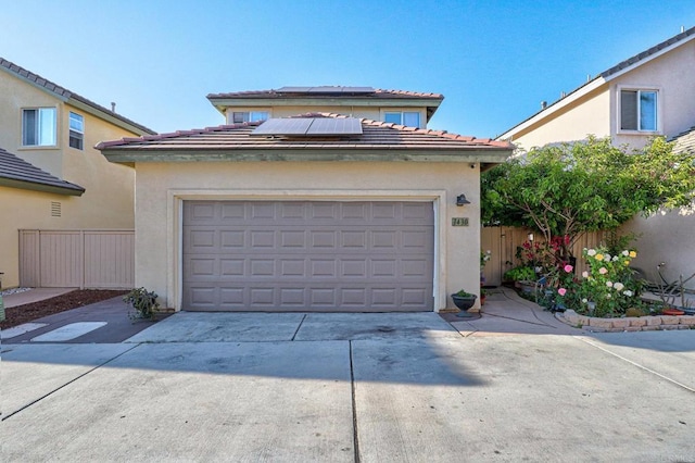 1430 Vallejo Mills St, Chula Vista, CA 91913 - view of front of property with concrete driveway, solar panels, stucco siding, a tile roof, and a garage