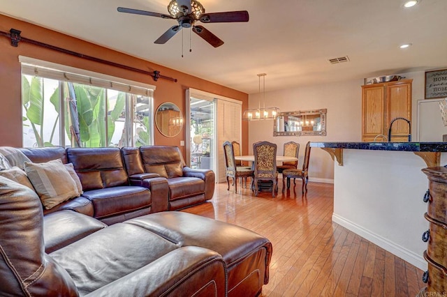 1430 Vallejo Mills St, Chula Vista, CA 91913 - living room featuring a ceiling fan, light wood-style flooring, a chandelier, and recessed lighting