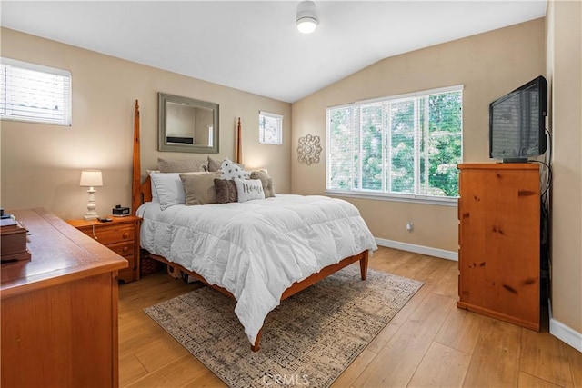 25525 Fitzgerald Ave, Stevenson Ranch, CA 91381 - bedroom featuring lofted ceiling and light wood-style flooring