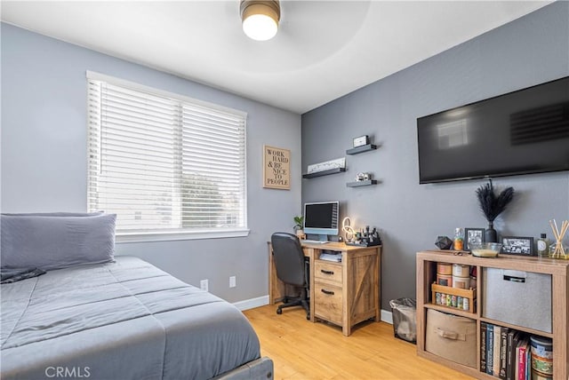25525 Fitzgerald Ave, Stevenson Ranch, CA 91381 - bedroom featuring wood finished floors and an office area