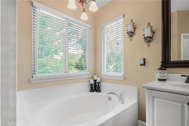 25525 Fitzgerald Ave, Stevenson Ranch, CA 91381 - bathroom featuring healthy amount of natural light, vanity, and a garden tub