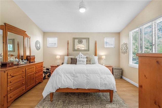 25525 Fitzgerald Ave, Stevenson Ranch, CA 91381 - bedroom featuring multiple windows and light wood-type flooring