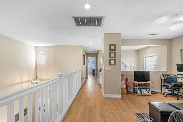 25525 Fitzgerald Ave, Stevenson Ranch, CA 91381 - corridor with light wood-type flooring and recessed lighting