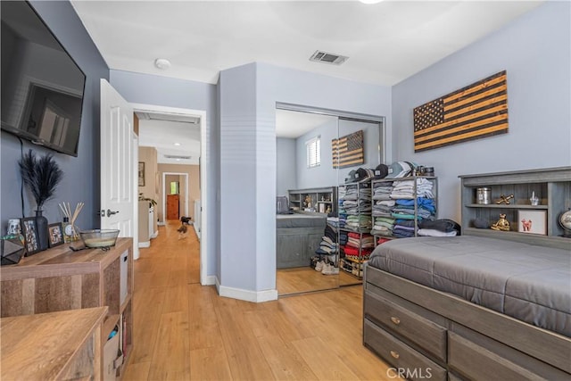 25525 Fitzgerald Ave, Stevenson Ranch, CA 91381 - bedroom featuring light wood-style flooring and a closet