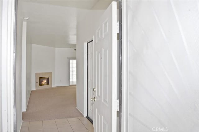 856 Liam Way, Beaumont, CA 92223 - corridor featuring light tile patterned floors and light carpet