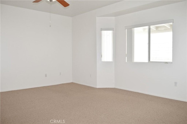856 Liam Way, Beaumont, CA 92223 - empty room featuring light colored carpet, healthy amount of natural light, and a ceiling fan