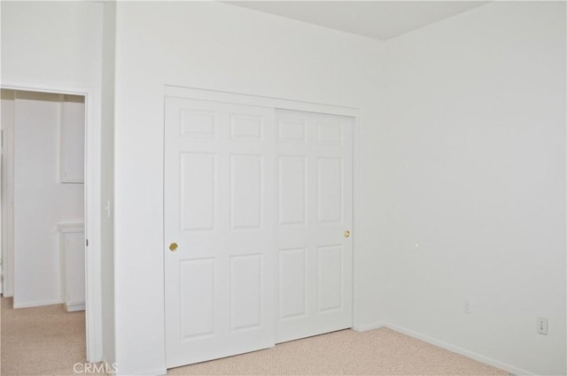 856 Liam Way, Beaumont, CA 92223 - unfurnished bedroom with light colored carpet and a closet