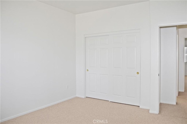 856 Liam Way, Beaumont, CA 92223 - unfurnished bedroom featuring light colored carpet and a closet