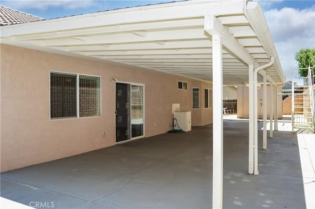 856 Liam Way, Beaumont, CA 92223 - view of patio featuring an attached carport