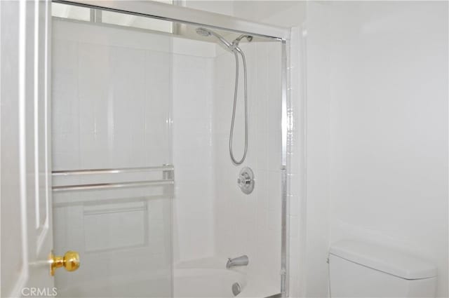 856 Liam Way, Beaumont, CA 92223 - bathroom with toilet and bath / shower combo with glass door