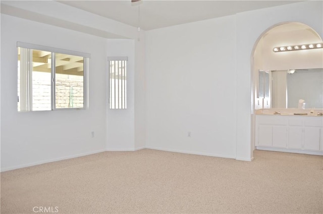 856 Liam Way, Beaumont, CA 92223 - unfurnished room with light carpet and arched walkways