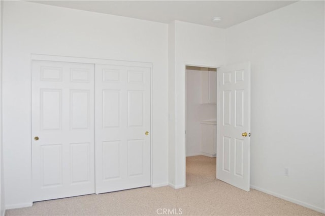 856 Liam Way, Beaumont, CA 92223 - unfurnished bedroom featuring light carpet and a closet