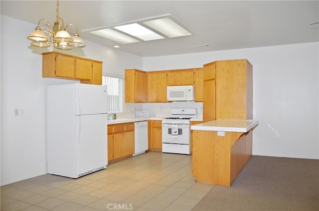 856 Liam Way, Beaumont, CA 92223 - kitchen with white appliances, a chandelier, a peninsula, and light countertops