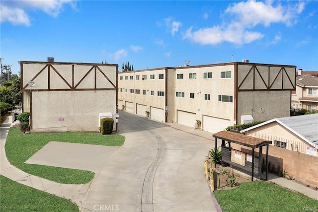 11331 Elliott Ave Unit 21, El Monte, CA 91732 - view of building exterior featuring driveway