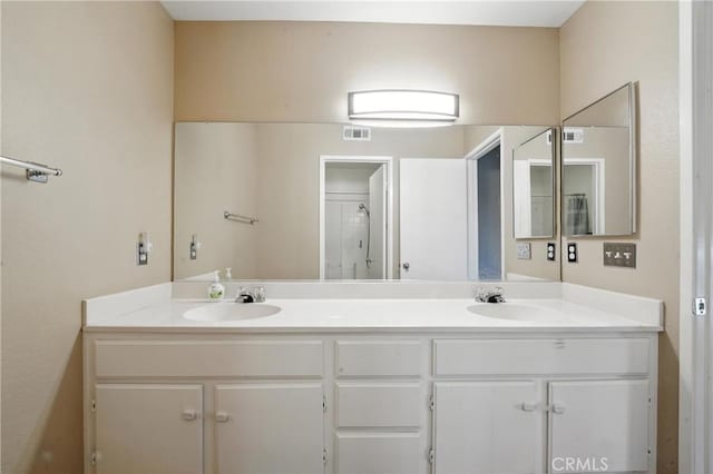 19121 Broken Bow Dr, Riverside, CA 92508 - full bathroom featuring double vanity and a shower