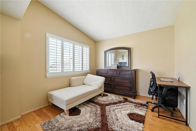 19121 Broken Bow Dr, Riverside, CA 92508 - office area featuring vaulted ceiling and wood finished floors