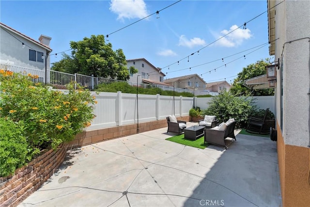 19121 Broken Bow Dr, Riverside, CA 92508 - fenced backyard with a patio area and an outdoor living space