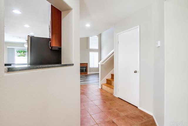 4620 Los Alamos Way Unit C, Oceanside, CA 92057 - corridor featuring plenty of natural light, stairway, light tile patterned floors, and recessed lighting