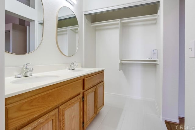 4620 Los Alamos Way Unit C, Oceanside, CA 92057 - bathroom with double vanity and tile patterned floors