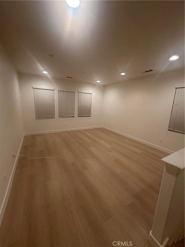 4974 S Rosemary Way, Ontario, CA 91762 - below grade area with light wood-style floors and recessed lighting