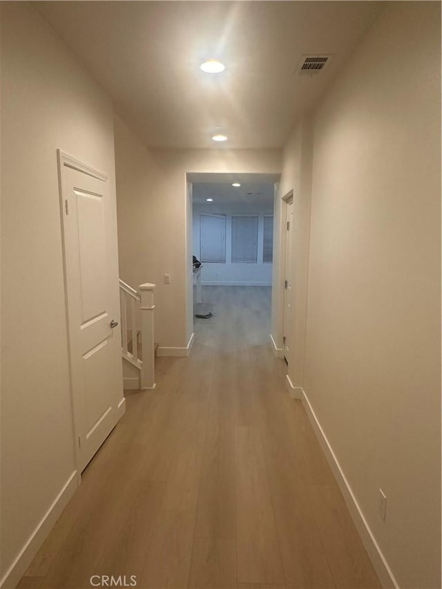 4974 S Rosemary Way, Ontario, CA 91762 - hall featuring an upstairs landing, recessed lighting, and light wood-style flooring