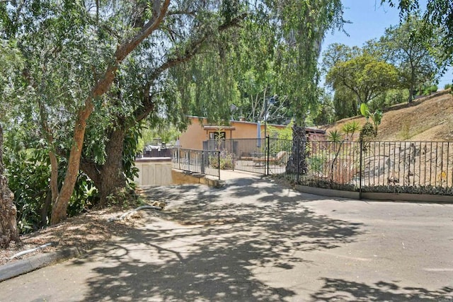 3135 S Bonita St, Spring Valley, CA 91977 - view of asphalt road featuring curbs