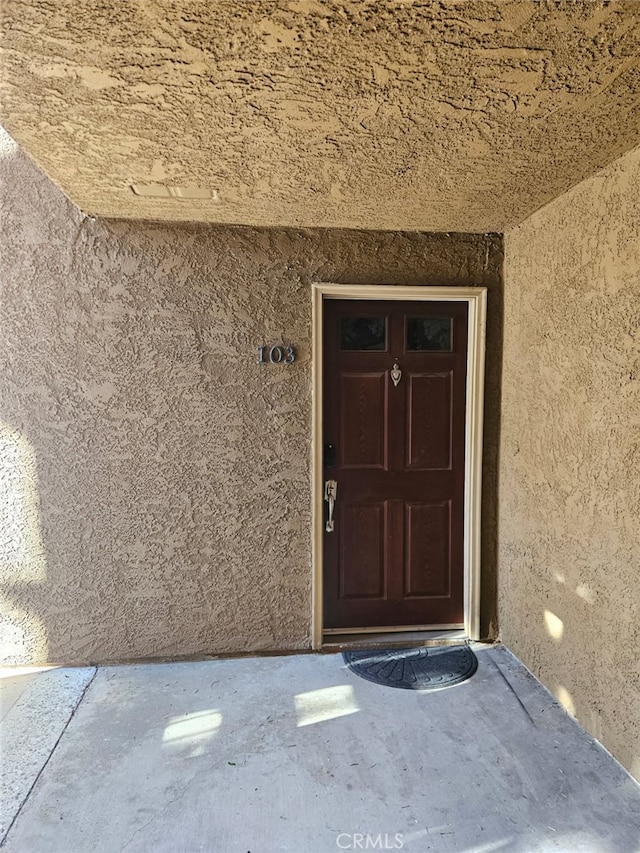 2350 Del Mar Way Unit 103, Corona, CA 92882 - property entrance featuring stucco siding