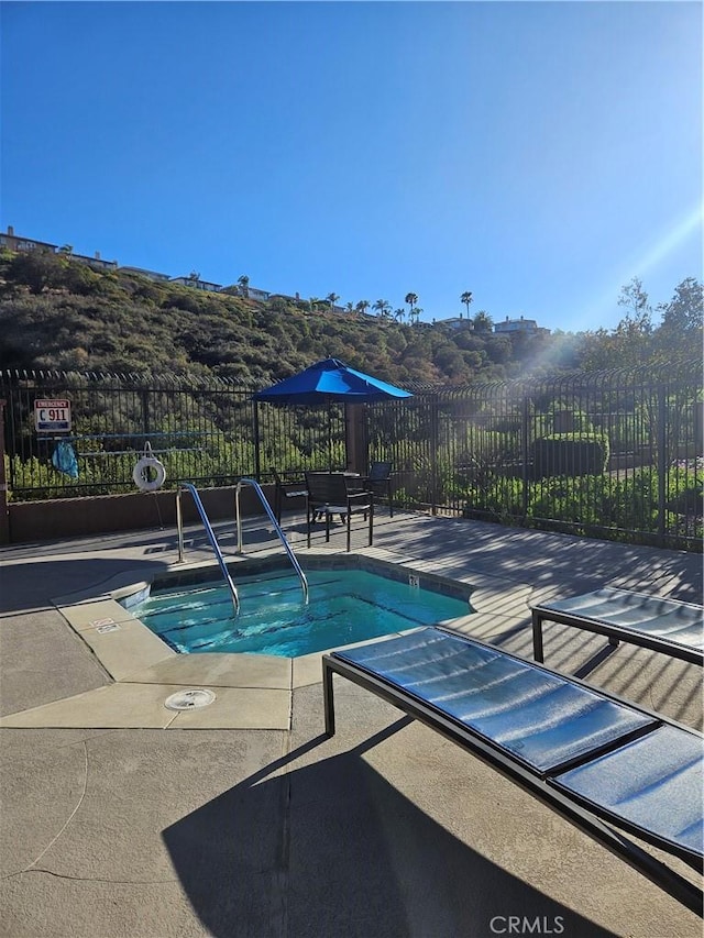2350 Del Mar Way Unit 103, Corona, CA 92882 - view of pool with a pool and a patio