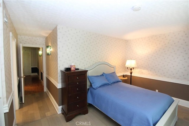 23281 Via Bahia, Mission Viejo, CA 92691 - bedroom with wood finished floors and wallpapered walls