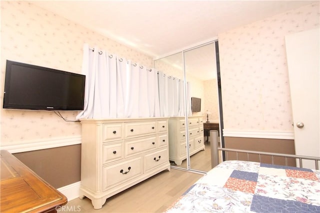 23281 Via Bahia, Mission Viejo, CA 92691 - bedroom featuring wallpapered walls, light wood-style floors, and a closet