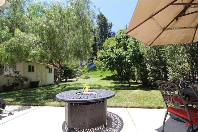23281 Via Bahia, Mission Viejo, CA 92691 - view of patio / terrace featuring a fire pit and a storage unit
