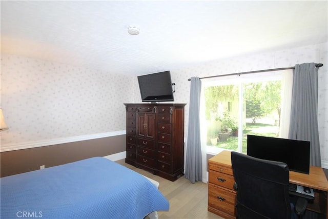 23281 Via Bahia, Mission Viejo, CA 92691 - bedroom with wallpapered walls and light wood-style flooring
