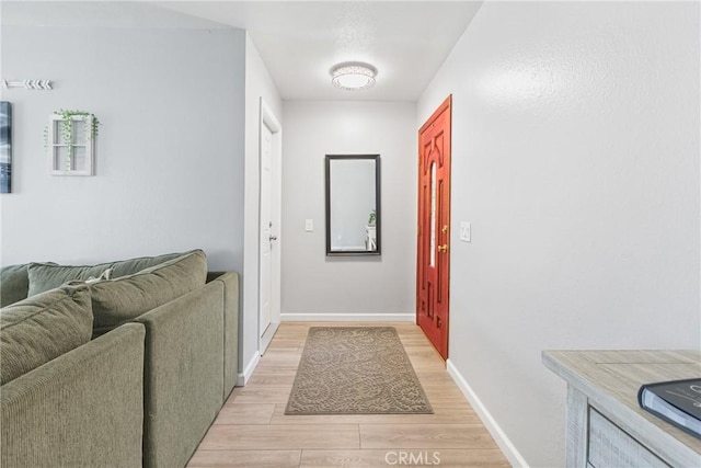 2951 S Plainfield Pl, Ontario, CA 91761 - entryway with baseboards and light wood-type flooring