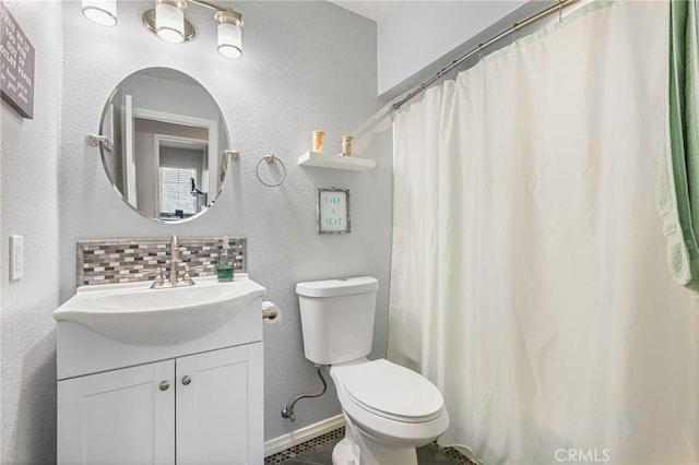 2951 S Plainfield Pl, Ontario, CA 91761 - bathroom featuring vanity, backsplash, a textured wall, and curtained shower