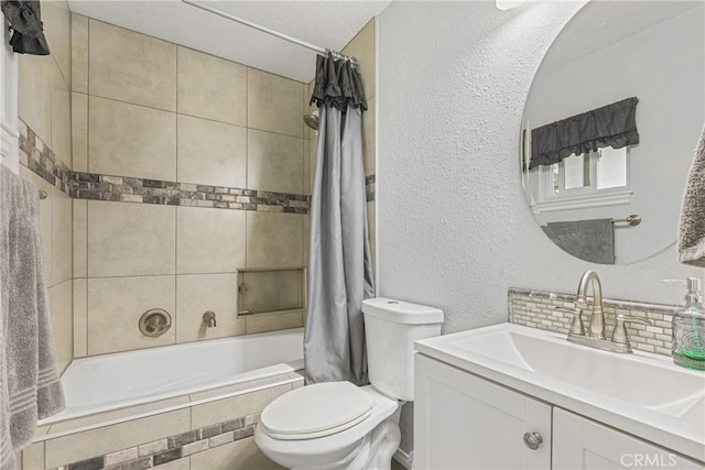 2951 S Plainfield Pl, Ontario, CA 91761 - full bath featuring tiled shower / bath combo, vanity, and a textured wall