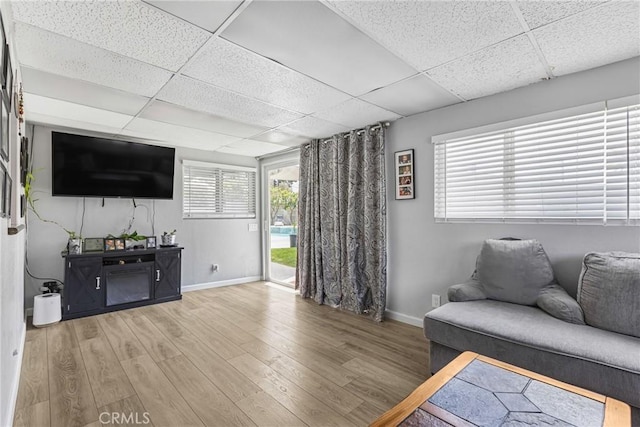 2951 S Plainfield Pl, Ontario, CA 91761 - living area featuring a drop ceiling and wood finished floors