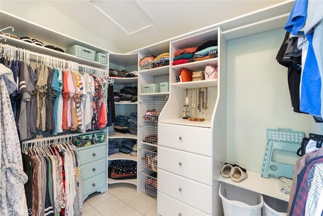 1225 Old Hickory Rd, Corona, CA 92882 - spacious closet with light tile patterned floors, attic access, and lofted ceiling