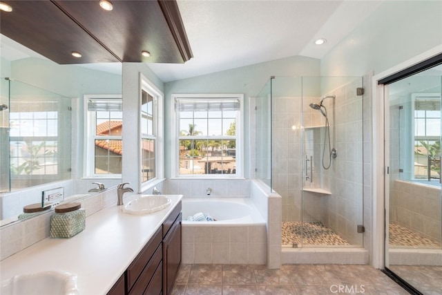 1225 Old Hickory Rd, Corona, CA 92882 - bathroom with a shower stall, double vanity, a garden tub, lofted ceiling, and recessed lighting