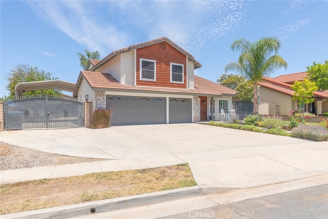 1225 Old Hickory Rd, Corona, CA 92882 - traditional-style home featuring a gate, driveway, a tile roof, an attached garage, and stucco siding