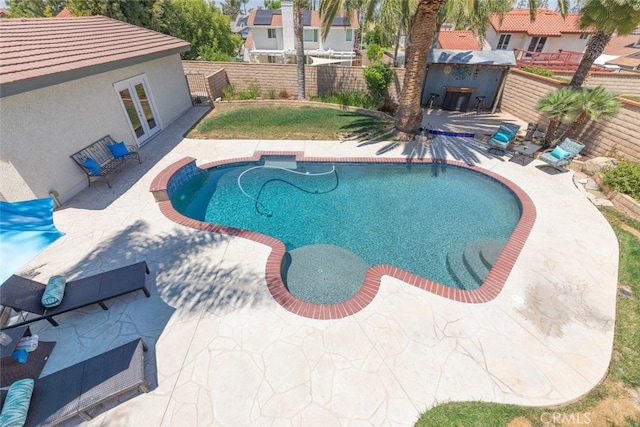 1225 Old Hickory Rd, Corona, CA 92882 - view of pool with a fenced backyard, a patio, and a residential view