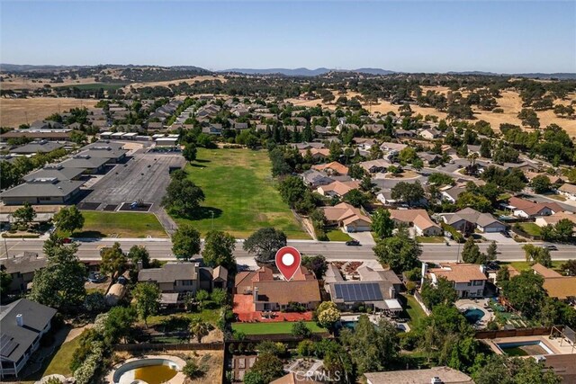215 Meadowlark Rd, Paso Robles, CA 93446 - aerial overview of property's location featuring nearby suburban area and a mountainous background