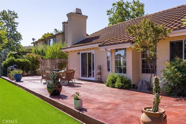 215 Meadowlark Rd, Paso Robles, CA 93446 - rear view of house with a tiled roof, a chimney, stucco siding, and a patio