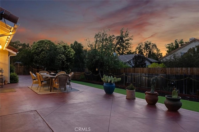 215 Meadowlark Rd, Paso Robles, CA 93446 - fenced backyard featuring a patio area and outdoor dining area